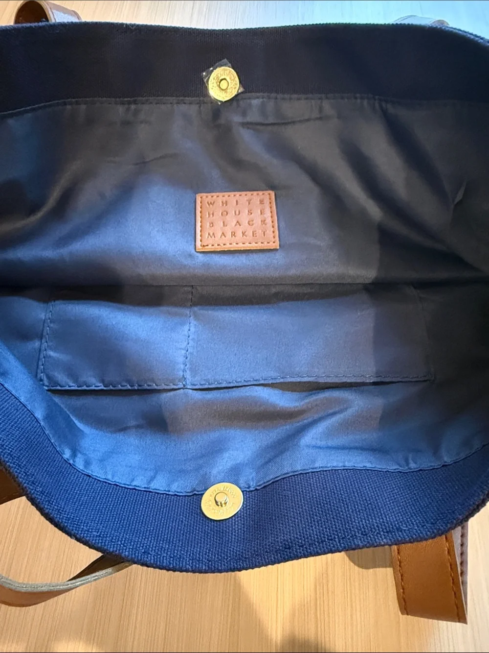 White House Black Market Navy Canvas Duffel with White Stripes and Brown Handles